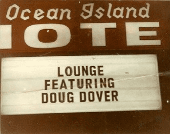 Ocean Island sign featuring Doug Dover.