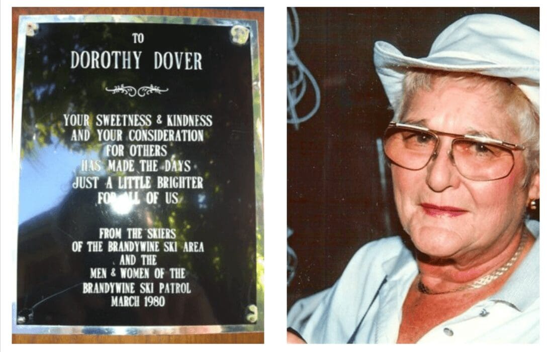 Plaque dedication and woman in white hat.