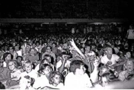 Crowd of people at a concert.