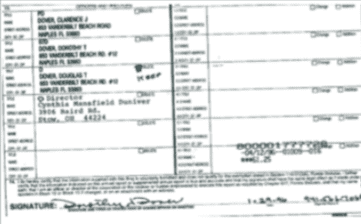 Close-up of a printed document with typed and handwritten text.