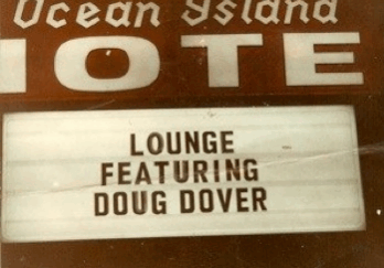 Ocean Island sign featuring Doug Dover.
