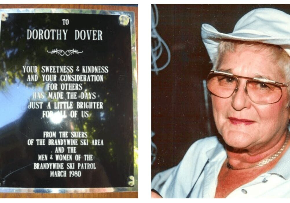 Plaque dedication and woman in white hat.